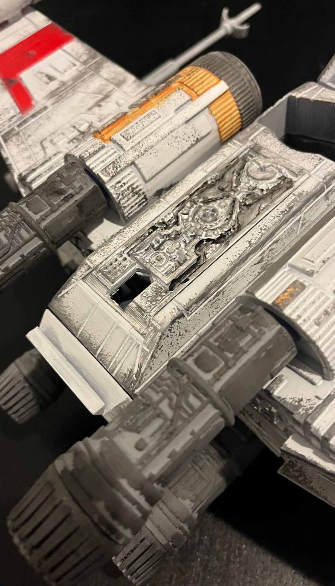 Close-up of the X-wing fuselage and engines showing the panel detail and weathering