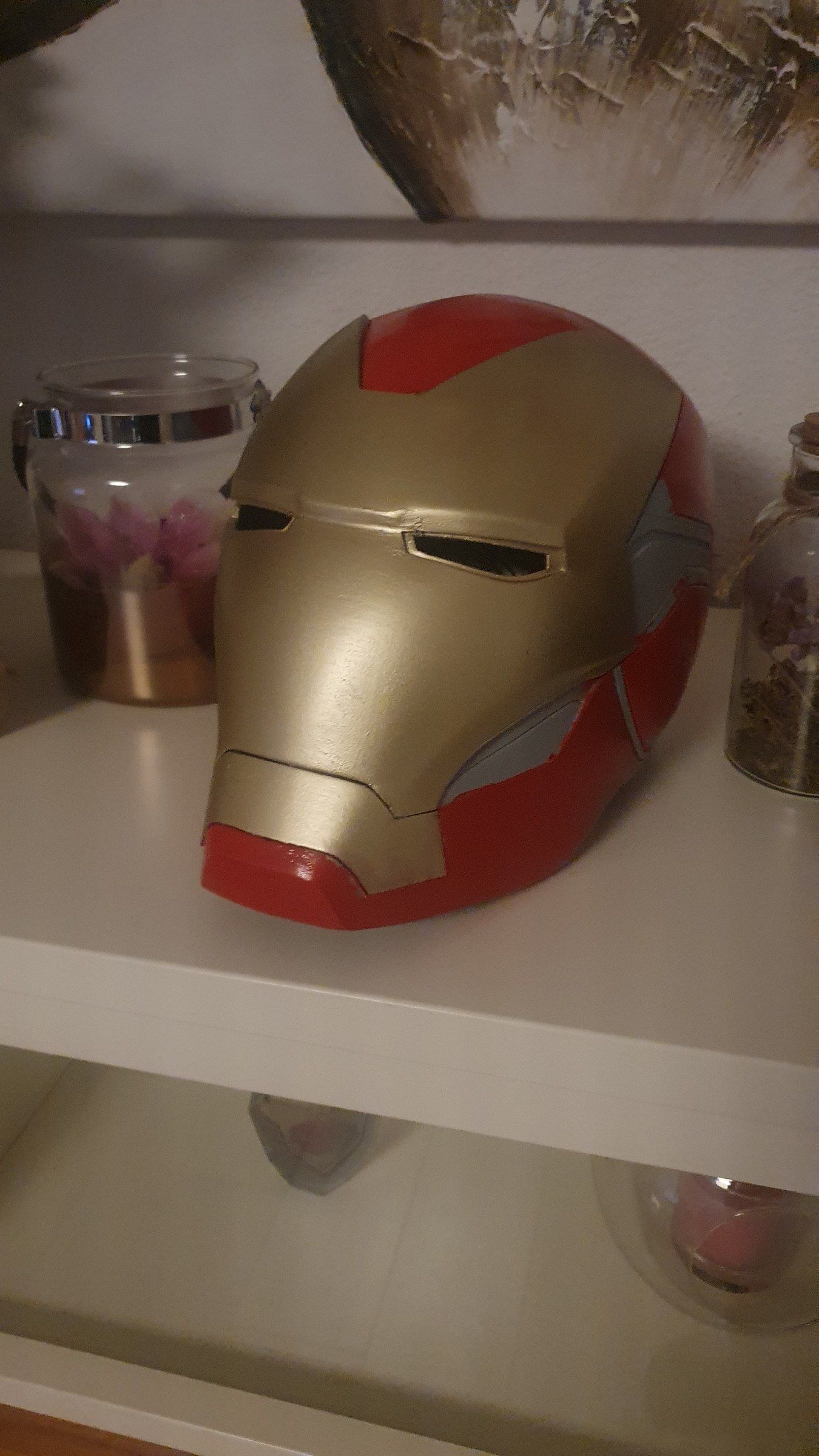The finished helmet on a white shelf at home