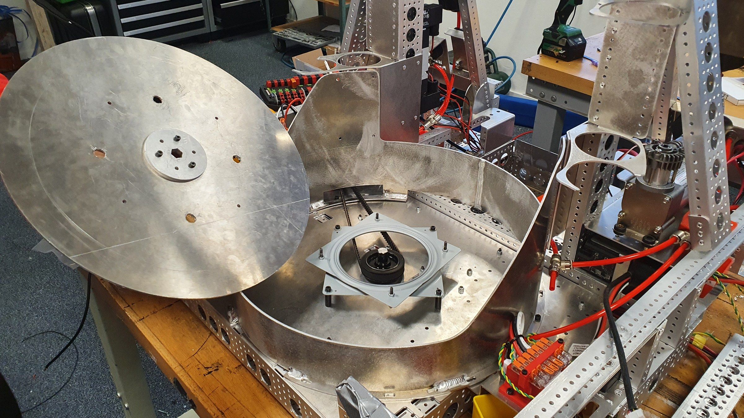 The robot chassis half-built on a workbench