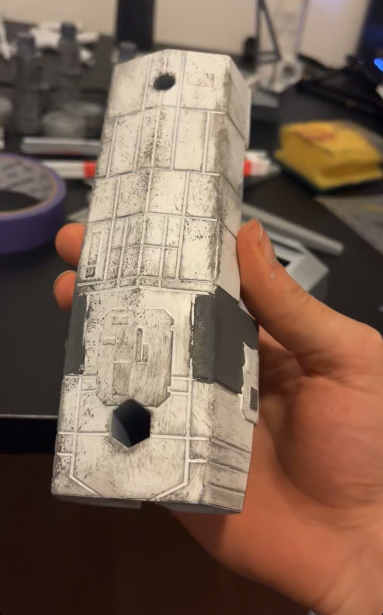 Close-up of a fuselage section with panel lines and weathering